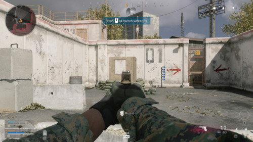 Press to switch weapons screenshot of Call of Duty: Modern Warfare video game interface.