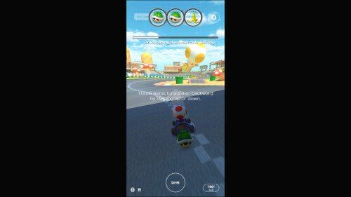 Tutorial screenshot of Mario Kart Tour video game interface.